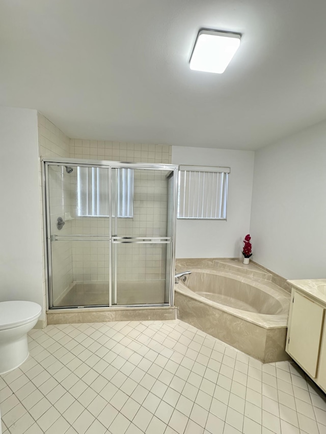 full bathroom featuring a shower stall, toilet, a bath, and tile patterned floors