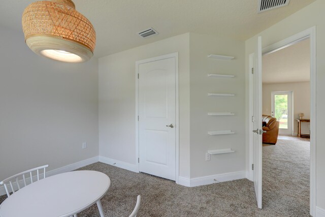 134 Day Dr, Sebastian, FL 32958 - dining room featuring carpet floors, baseboards, and visible vents