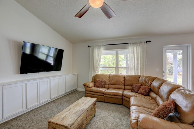 134 Day Dr, Sebastian, FL 32958 - living area featuring light carpet, a textured ceiling, lofted ceiling, and ceiling fan