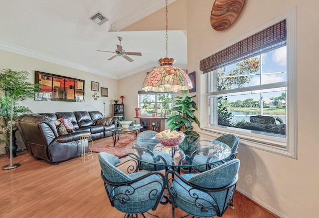 8328 Grand Messina Cir, Boynton Beach, FL 33472 - dining room featuring ornamental molding, baseboards, ceiling fan, light wood-style flooring, and visible vents