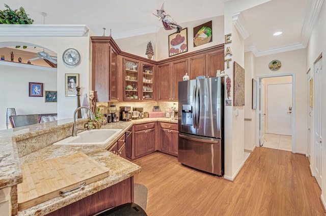 8328 Grand Messina Cir, Boynton Beach, FL 33472 - kitchen with ornamental molding, a sink, stainless steel fridge with ice dispenser, and light wood-style floors