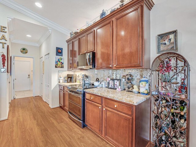 8328 Grand Messina Cir, Boynton Beach, FL 33472 - kitchen with light wood finished floors, crown molding, backsplash, and stainless steel appliances