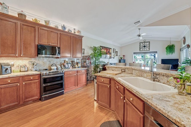 8328 Grand Messina Cir, Boynton Beach, FL 33472 - kitchen featuring open floor plan, stainless steel appliances, a sink, ceiling fan, and visible vents