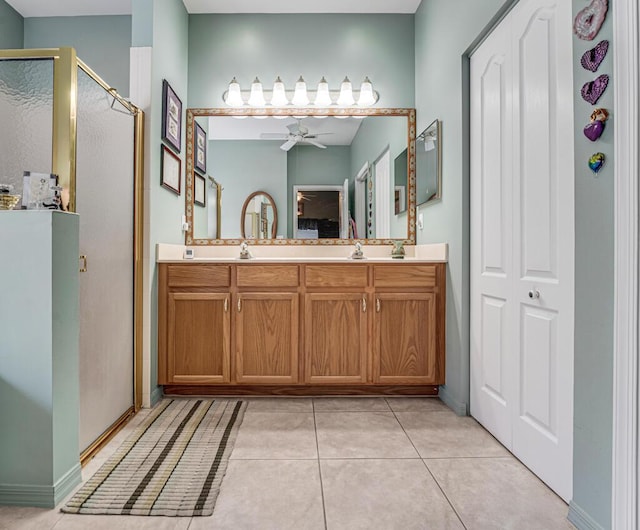 8328 Grand Messina Cir, Boynton Beach, FL 33472 - bathroom with a ceiling fan, double vanity, tile patterned floors, and a stall shower