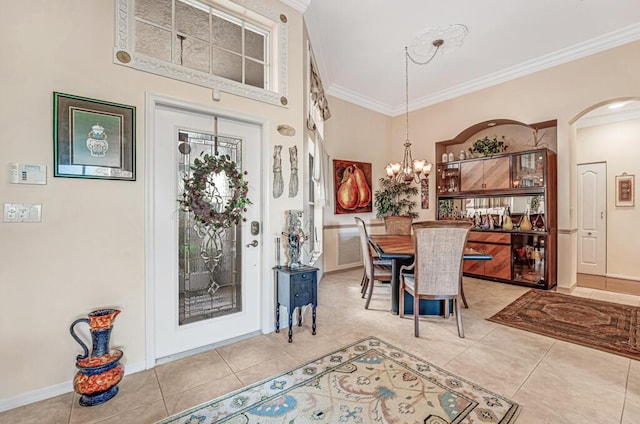 8328 Grand Messina Cir, Boynton Beach, FL 33472 - entrance foyer featuring arched walkways, ornamental molding, and light tile patterned floors