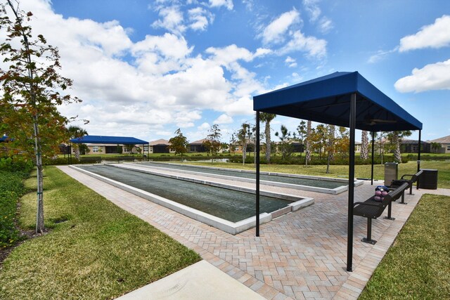 8318 Cameron Cave Dr, Boynton Beach, FL 33473 - view of property's community with a yard