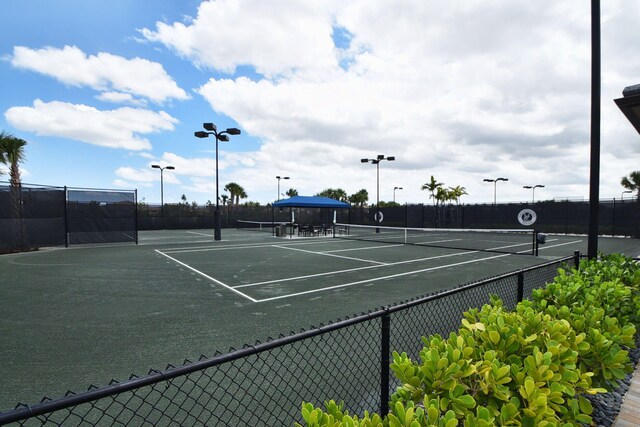 8318 Cameron Cave Dr, Boynton Beach, FL 33473 - view of sport court featuring fence