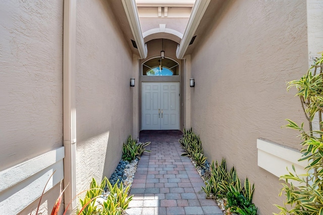 8318 Cameron Cave Dr, Boynton Beach, FL 33473 - doorway to property featuring stucco siding