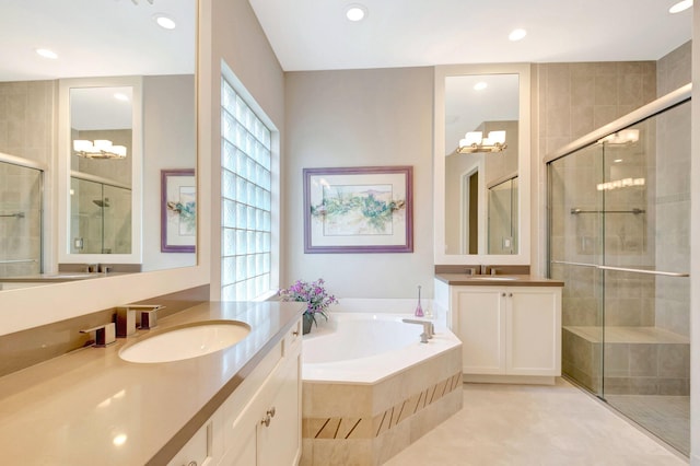 8318 Cameron Cave Dr, Boynton Beach, FL 33473 - bathroom featuring a shower stall, a healthy amount of sunlight, a sink, and a garden tub