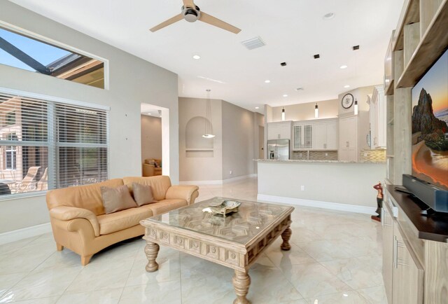 8318 Cameron Cave Dr, Boynton Beach, FL 33473 - living room featuring recessed lighting, baseboards, ceiling fan, and visible vents