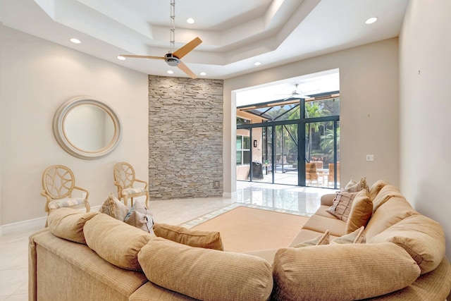 8318 Cameron Cave Dr, Boynton Beach, FL 33473 - living area with a tray ceiling, a sunroom, baseboards, ceiling fan, and recessed lighting