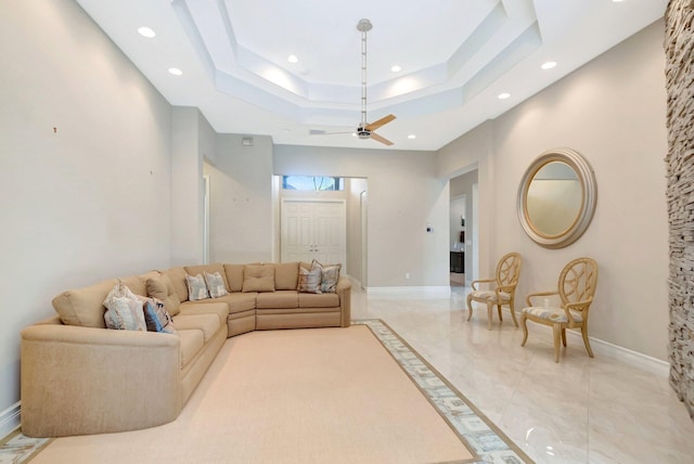 8318 Cameron Cave Dr, Boynton Beach, FL 33473 - living area with a ceiling fan, a tray ceiling, baseboards, and recessed lighting