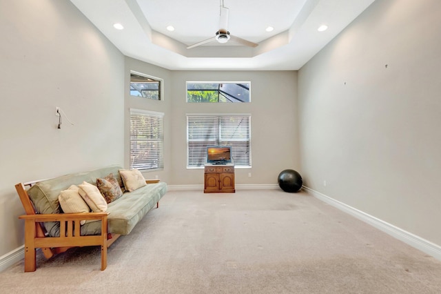 8318 Cameron Cave Dr, Boynton Beach, FL 33473 - sitting room featuring a tray ceiling, recessed lighting, baseboards, ceiling fan, and light carpet