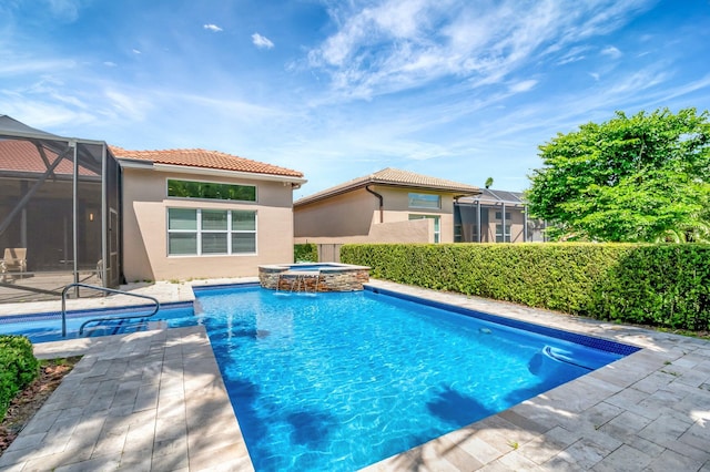 8318 Cameron Cave Dr, Boynton Beach, FL 33473 - view of pool featuring a pool with connected hot tub, a lanai, and a patio area