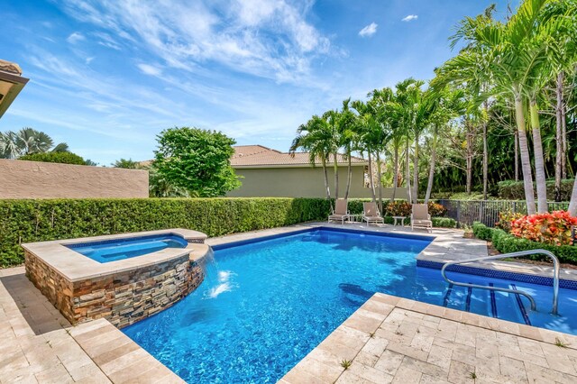 8318 Cameron Cave Dr, Boynton Beach, FL 33473 - view of pool featuring a fenced backyard, a pool with connected hot tub, and a patio