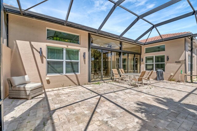 8318 Cameron Cave Dr, Boynton Beach, FL 33473 - exterior space with a lanai, stucco siding, and a patio