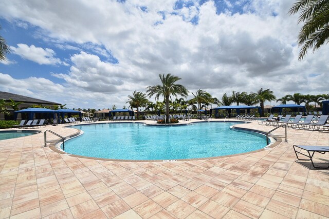 8318 Cameron Cave Dr, Boynton Beach, FL 33473 - pool featuring a patio