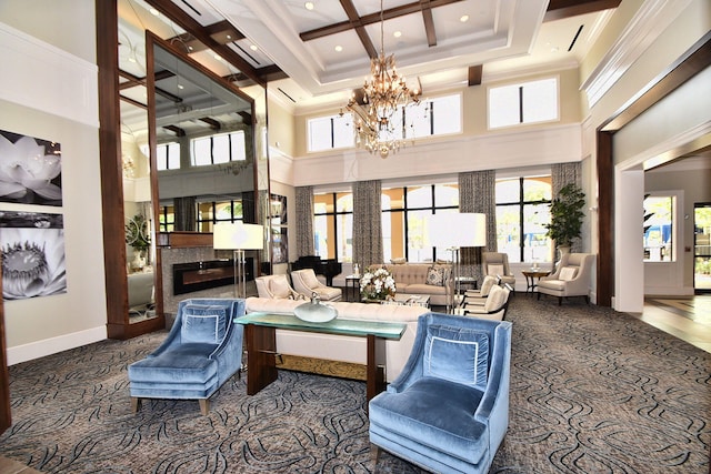 8318 Cameron Cave Dr, Boynton Beach, FL 33473 - living room featuring coffered ceiling, beam ceiling, a chandelier, a glass covered fireplace, and baseboards