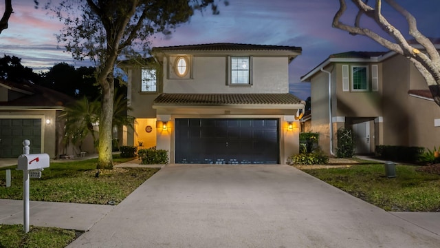 3773 NW 63rd Ct, Coconut Creek, FL 33073 - view of front of property featuring a tiled roof, stucco siding, an attached garage, and concrete driveway