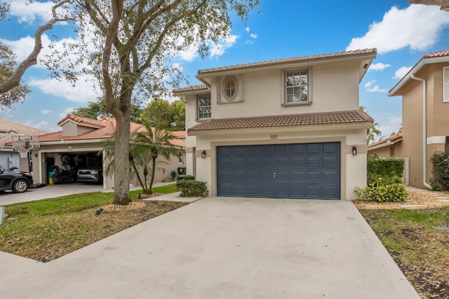 3773 NW 63rd Ct, Coconut Creek, FL 33073 - mediterranean / spanish-style home with stucco siding, a garage, a tiled roof, and concrete driveway