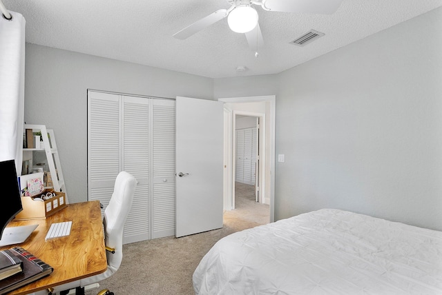 3773 NW 63rd Ct, Coconut Creek, FL 33073 - carpeted bedroom with a textured ceiling, a closet, ceiling fan, and visible vents
