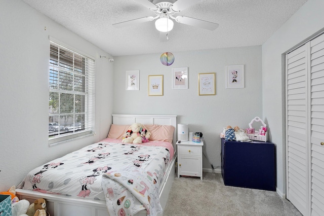 3773 NW 63rd Ct, Coconut Creek, FL 33073 - bedroom featuring light carpet, a closet, ceiling fan, and a textured ceiling