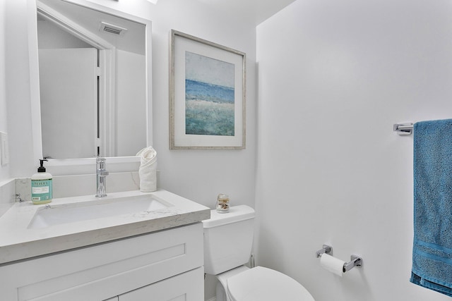 3773 NW 63rd Ct, Coconut Creek, FL 33073 - half bathroom with visible vents, toilet, and vanity