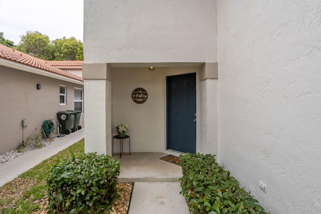 3773 NW 63rd Ct, Coconut Creek, FL 33073 - entrance to property featuring a tile roof and stucco siding