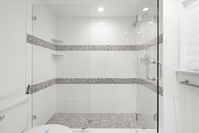 2575 S Ocean Blvd Unit 102S, Highland Beach, FL 33487 - bathroom with toilet, a shower stall, and recessed lighting