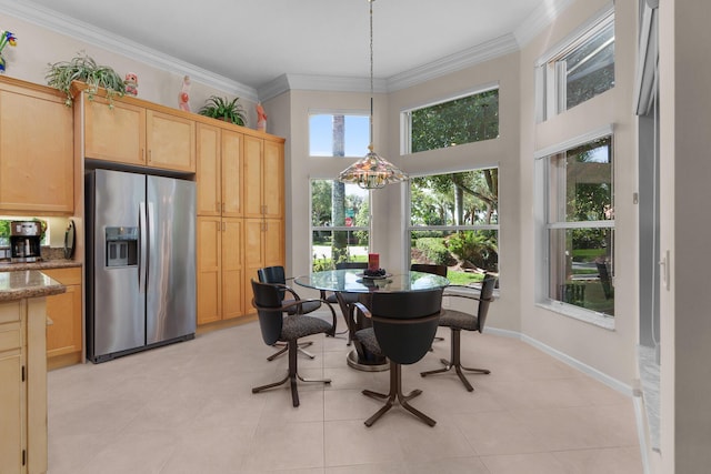 7406 Carmela Way, Delray Beach, FL 33446 - dining room featuring plenty of natural light, ornamental molding, light tile patterned floors, a high ceiling, and baseboards