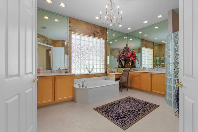 7406 Carmela Way, Delray Beach, FL 33446 - full bathroom with two vanities, a garden tub, recessed lighting, tile patterned floors, and a chandelier