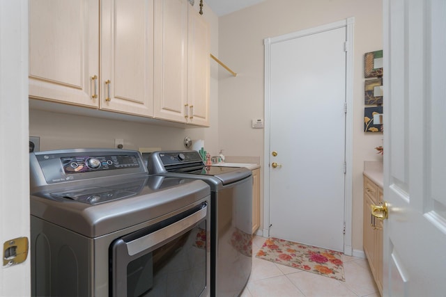 7406 Carmela Way, Delray Beach, FL 33446 - laundry room featuring cabinet space, washing machine and clothes dryer, and light tile patterned floors