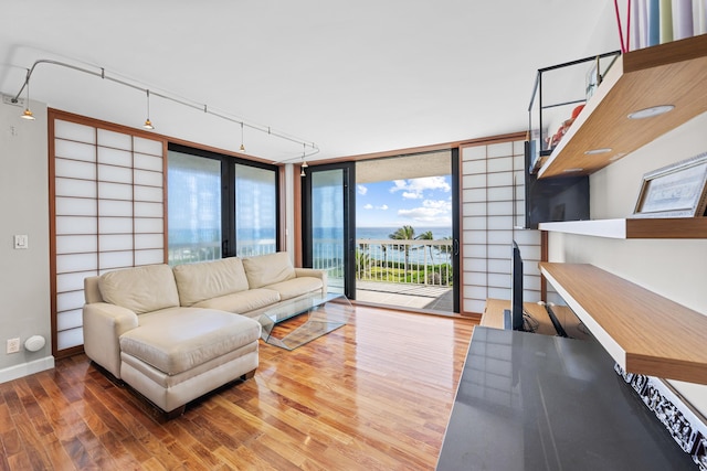 3250 S Ocean Blvd Unit 406-N, Palm Beach, FL 33480 - living area featuring wood finished floors and baseboards