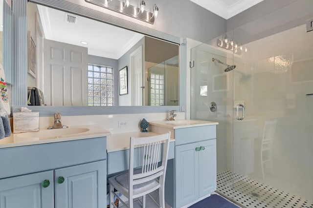 full bath with visible vents, a sink, crown molding, double vanity, and a stall shower