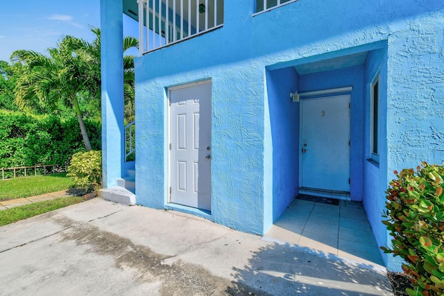 6881 Church St, Jupiter, FL 33458 - entrance to property with stucco siding
