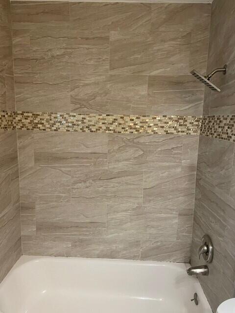6881 Church St, Jupiter, FL 33458 - full bathroom featuring tub / shower combination