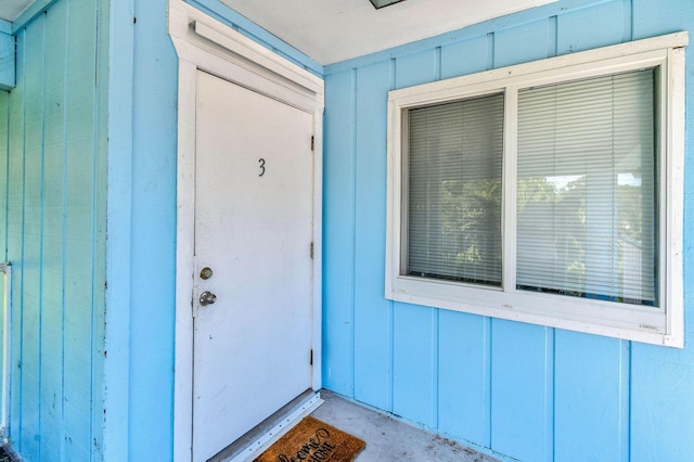 6881 Church St, Jupiter, FL 33458 - property entrance with board and batten siding