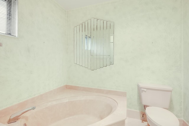 full bath with a bath and toilet