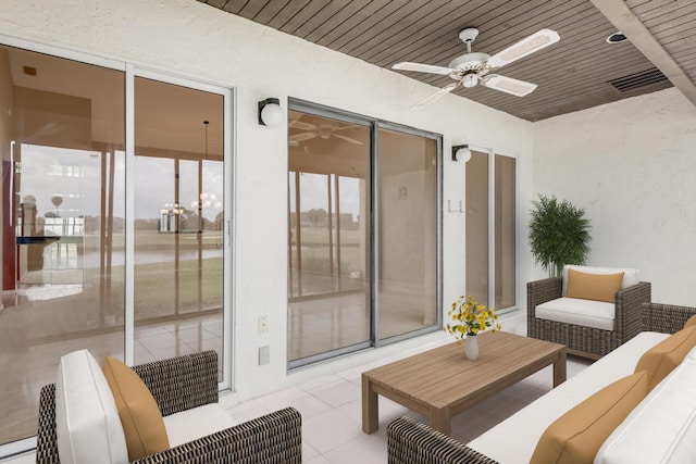 view of patio featuring a ceiling fan and outdoor lounge area