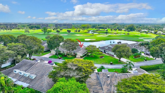 drone / aerial view featuring a water view and golf course view