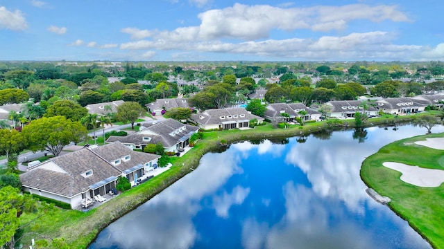 bird's eye view featuring a residential view and a water view