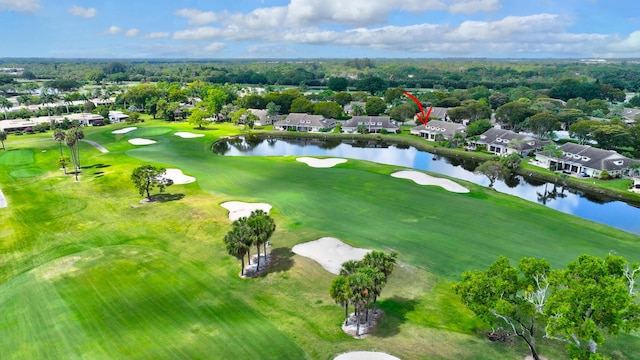 birds eye view of property featuring a water view and a residential view