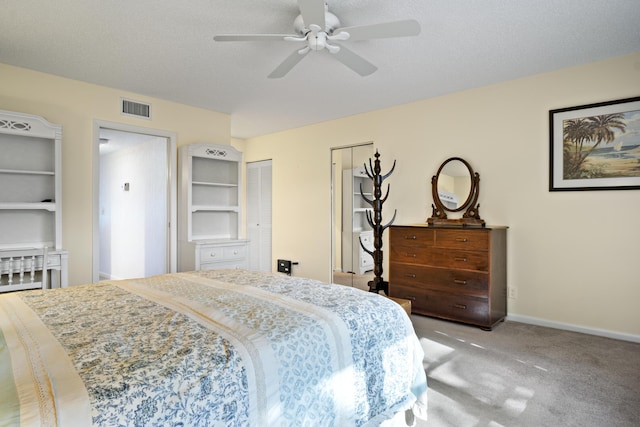 4810 NW 4th St Unit C, Delray Beach, FL 33445 - carpeted bedroom featuring baseboards, a textured ceiling, visible vents, and ceiling fan