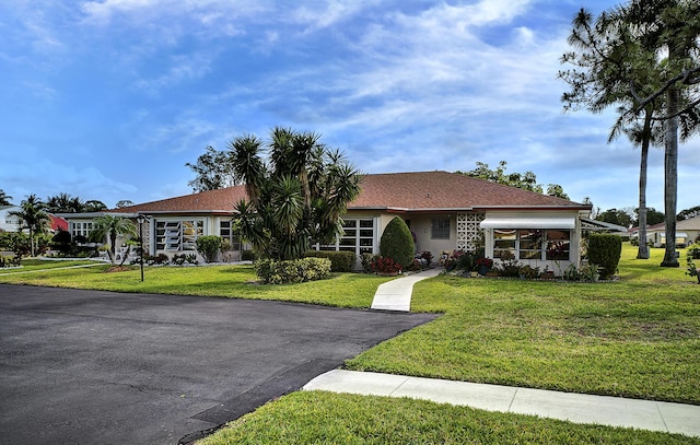 4810 NW 4th St Unit C, Delray Beach, FL 33445 - single story home with a front yard and stucco siding