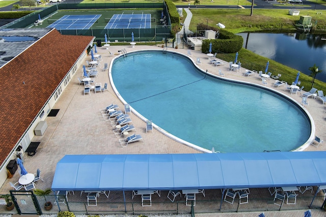 4810 NW 4th St Unit C, Delray Beach, FL 33445 - community pool with a water view, fence, and a patio