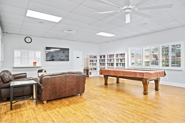 4810 NW 4th St Unit C, Delray Beach, FL 33445 - game room featuring a ceiling fan, baseboards, light wood finished floors, and a paneled ceiling