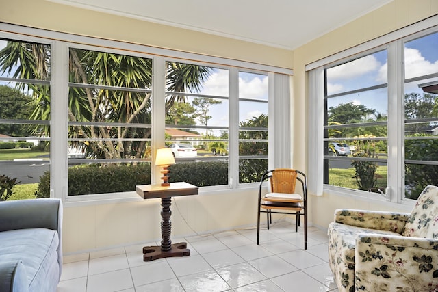 4810 NW 4th St Unit C, Delray Beach, FL 33445 - sunroom / solarium featuring tile patterned floors, plenty of natural light, and crown molding