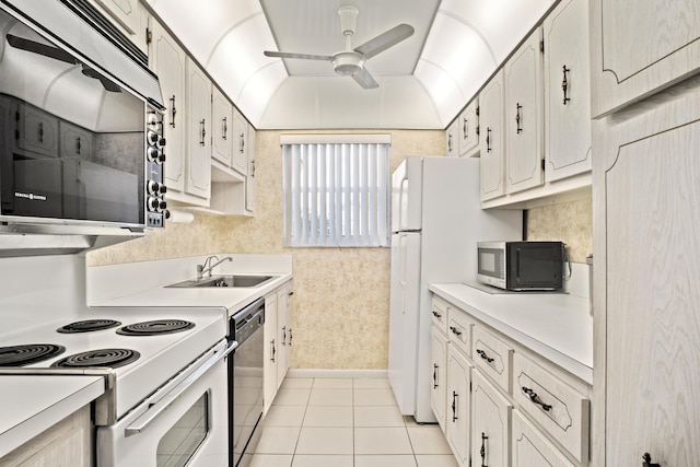 4810 NW 4th St Unit C, Delray Beach, FL 33445 - kitchen with a ceiling fan, light countertops, dishwasher, and stainless steel microwave