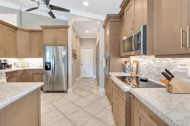 8353 Grand Messina Cir, Boynton Beach, FL 33472 - kitchen with light tile patterned floors, light countertops, crown molding, ceiling fan, and stainless steel appliances