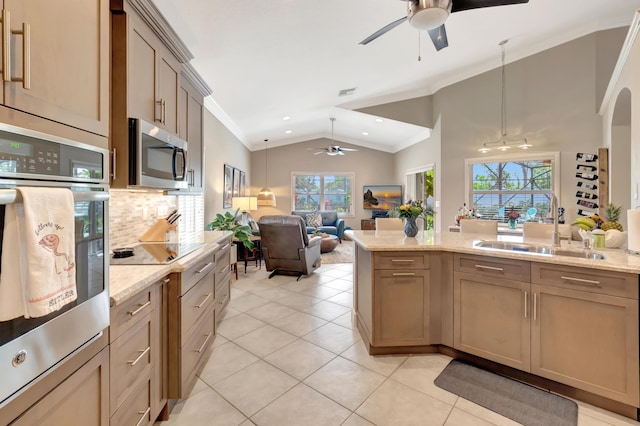 8353 Grand Messina Cir, Boynton Beach, FL 33472 - kitchen featuring stainless steel microwave, open floor plan, a ceiling fan, lofted ceiling, and a sink
